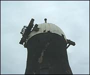 Damaged windmill cap
