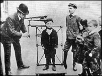 Boy being weighed 1907