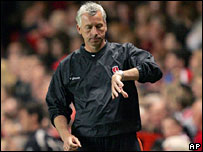Charlton Athletic's coach Alan Pardew looks at his watch as his team plays Tottenham Hotspur 