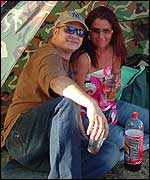 Picture: Couple in the crowd: link.