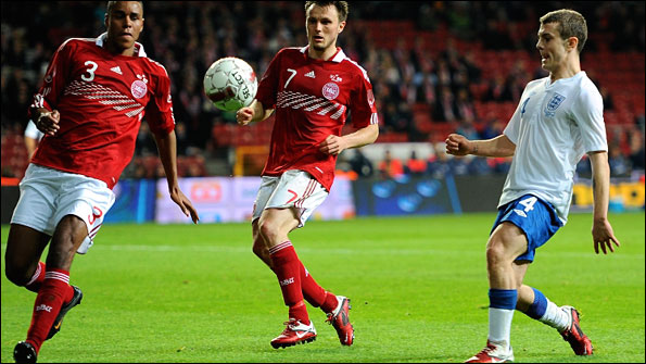Mathias Jorgensen and William Kvist Jorgensen of Denmark and England's Jack Wilshere
