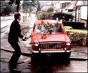 Basil gives his car a good hiding