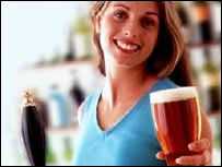 Barmaid serving a pint