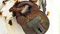 A rusty padlock