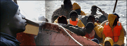 African migrants on a open top boat