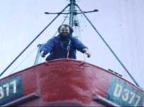 Nutty aboard his boat