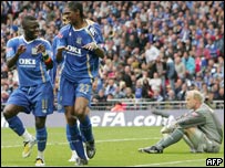Portsmouth players celebrate a goal