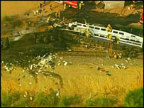 Derailed coaches at the site of the collision