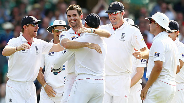 James Anderson is mobbed after striking in Australia's second innings