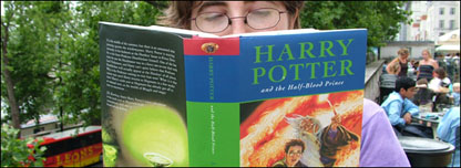 A British person reading a Harry Potter book