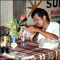 Shiva in Goa, reading the Lonely Planet guide in which he gets a mention