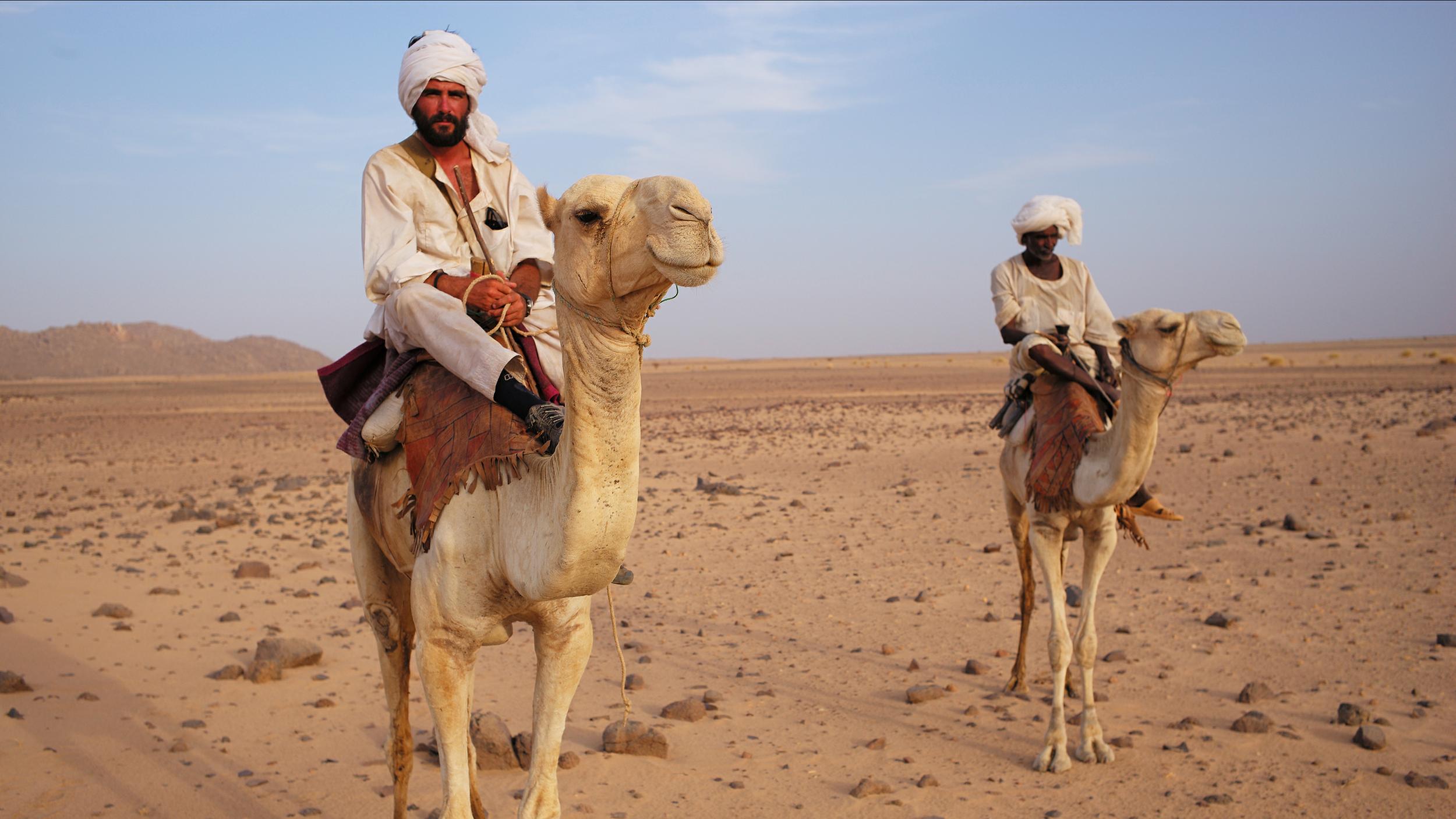 Wood and his guide in Sudan's Bayuda Desert. Photo © Ash Bhardwaj